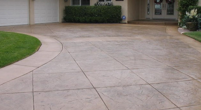Tile style stamped and stained concrete driveway