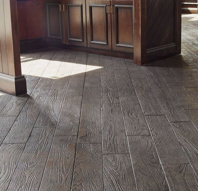 Wood grain plank style interior concrete floor.