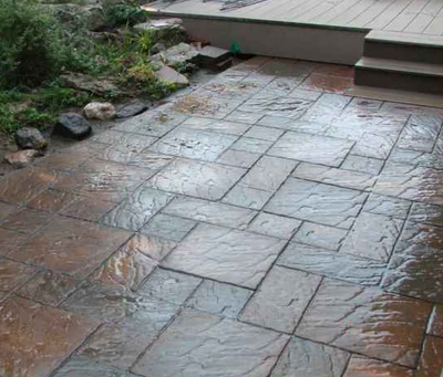 Stone paver style stamped concrete patio in Milford.