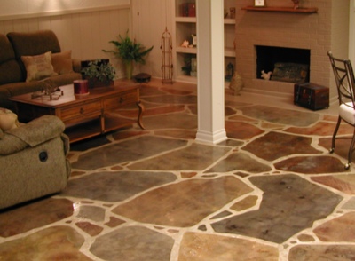 Interior floor made of multi-colored stamped and colored concrete.