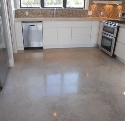 Interior concrete floor that is stained and polished.