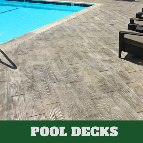 Milford stamped concrete pool surround with a wood grain finish.